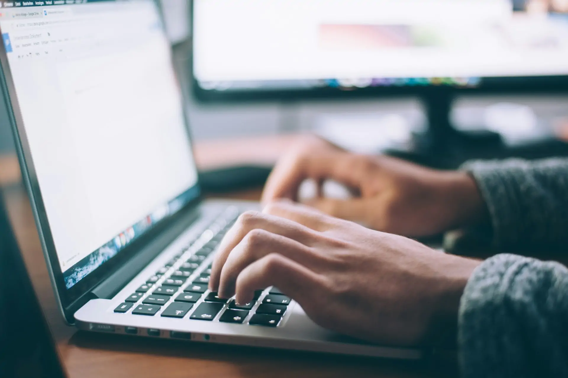User researching data on a laptop